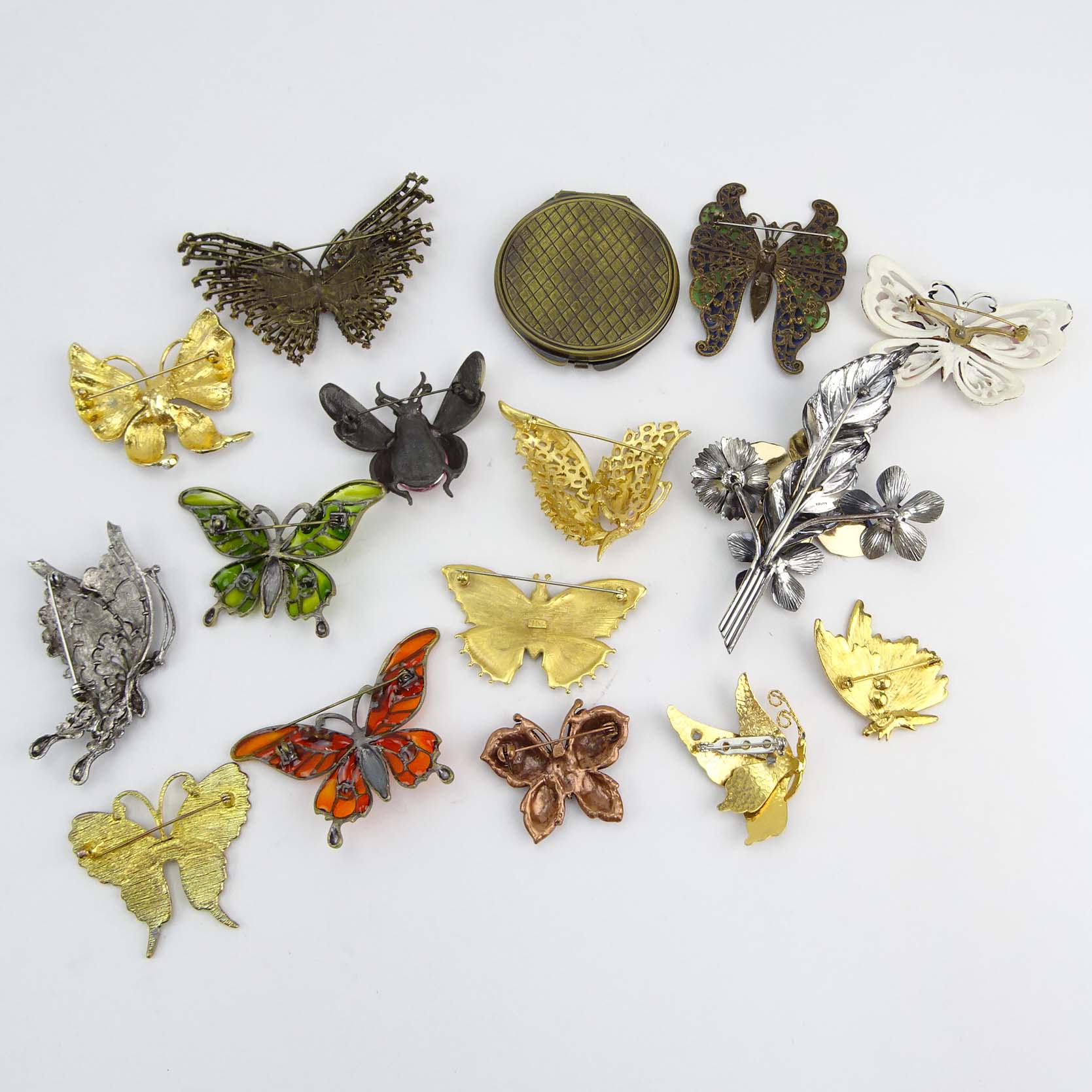 Collection of Fifteen (15) Fashion Butterfly Brooches and One (1) Compact variously with enamel and faux gem stones.