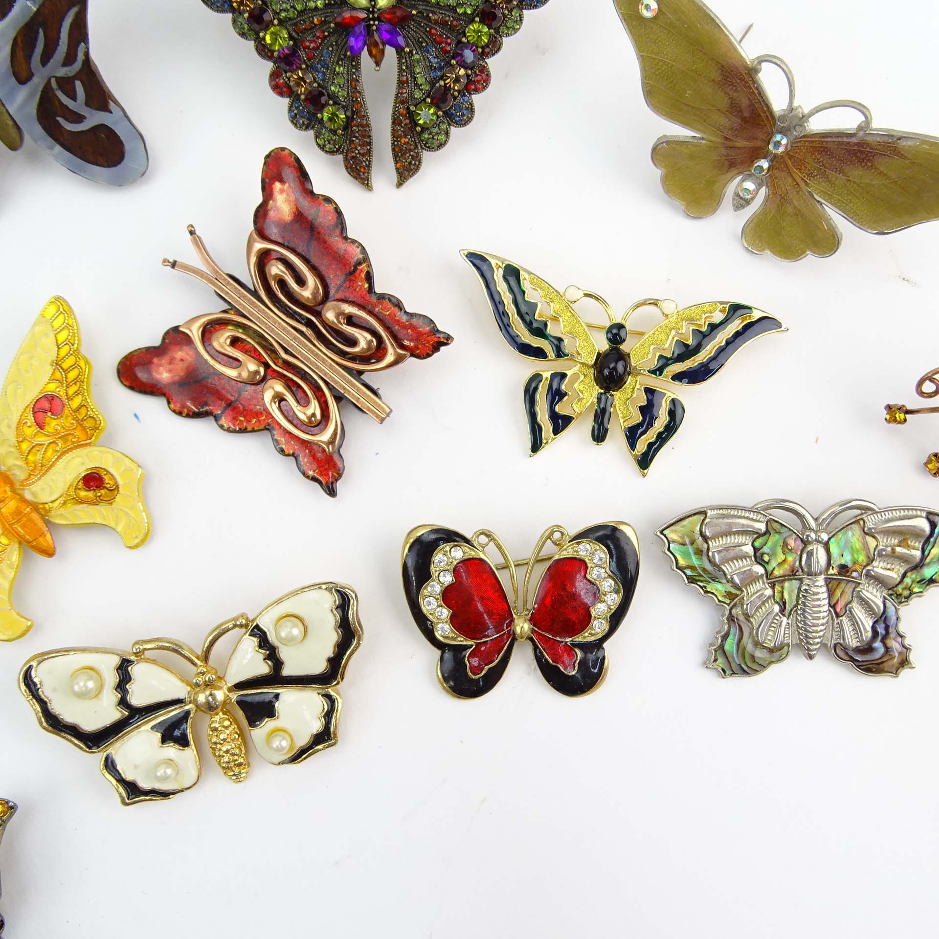 Collection of Fifteen (15) Fashion Butterfly Brooches decorated variously with enamel and faux gem stones.