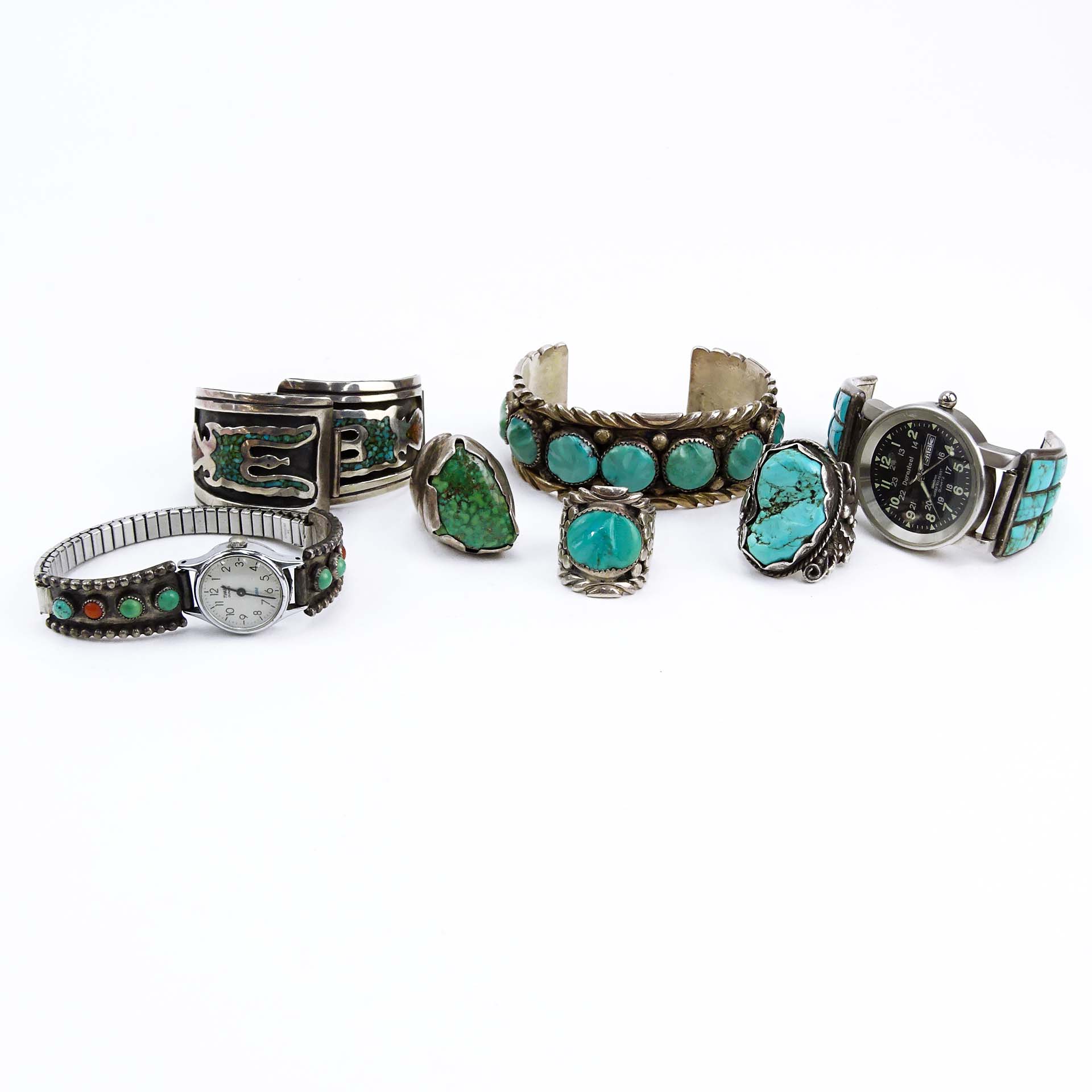 Vintage Seven (7) Piece Collection of Navajo or Navajo style Sterling Silver and Turquoise Jewelry.