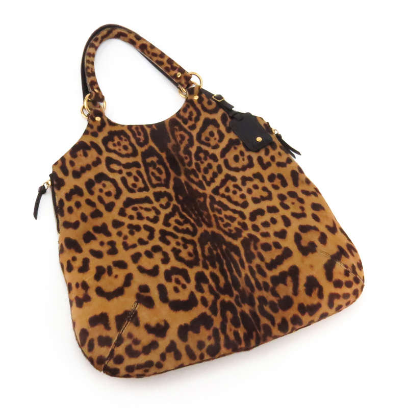 Yves Saint Laurent Printed Cowhide Leather Hobo Style Bag.