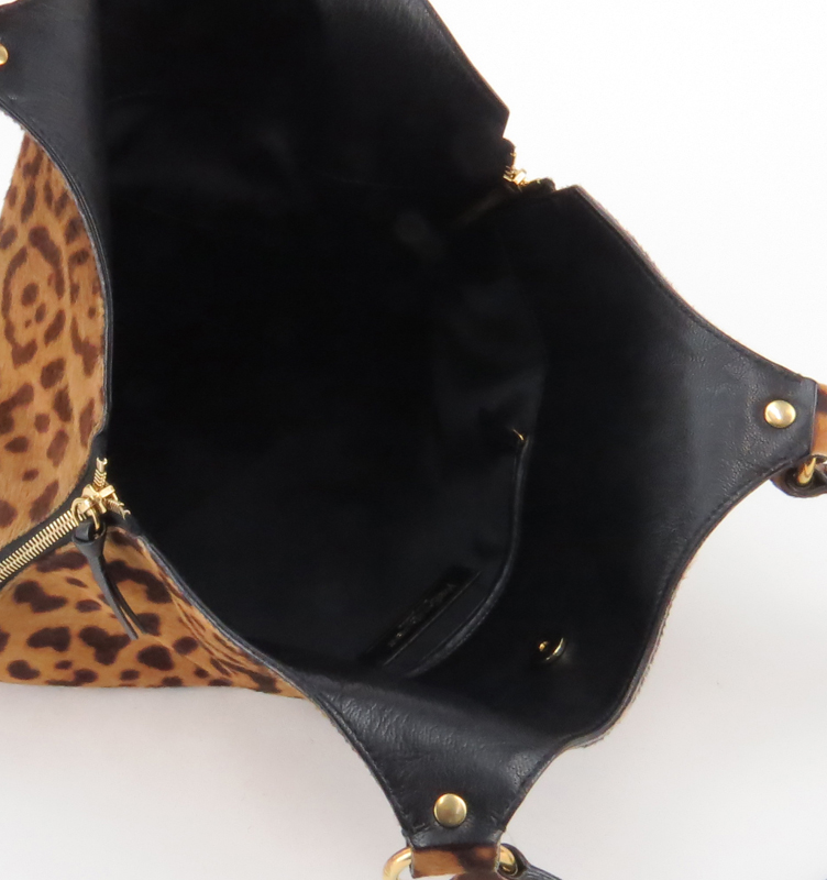 Yves Saint Laurent Printed Cowhide Leather Hobo Style Bag.