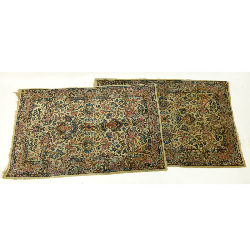 Pair of Semi Antique Kerman Rugs. Mainly tan with multi color floral motif.