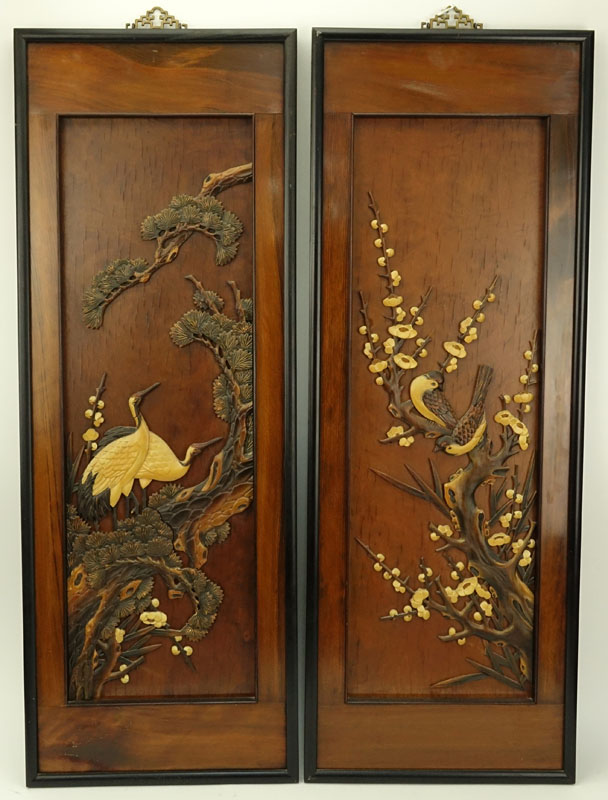 Pair of Oriental Carved Wood Wall Panels. Label marked "Made in Taiwan Republic of China" affixed en verso. 