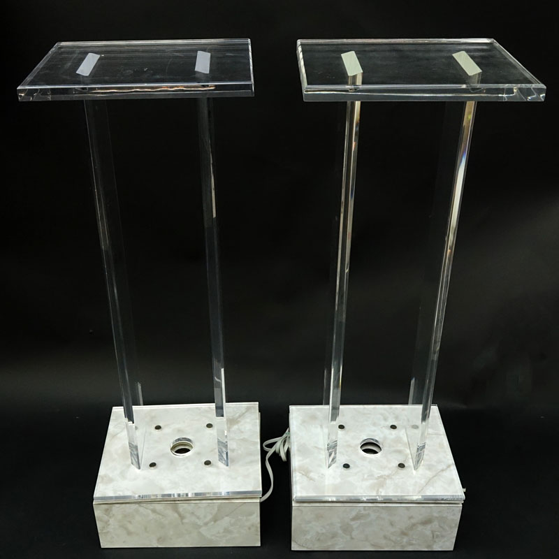 Pair of Modern Lucite and Lacquer Electrified Swivel Pedestals. Marbleized lacquer base with mounted light fixture.