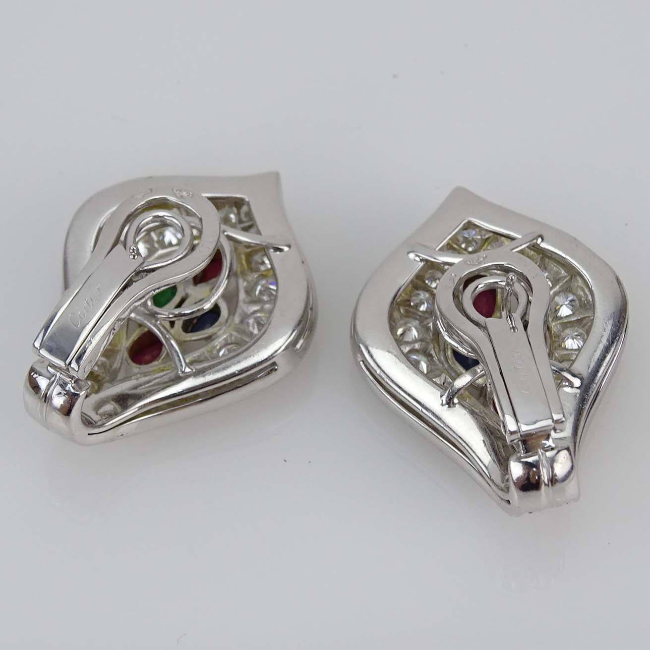 Cartier Diamond, Ruby, Emerald, Sapphire and 18 Karat White Gold Earrings.