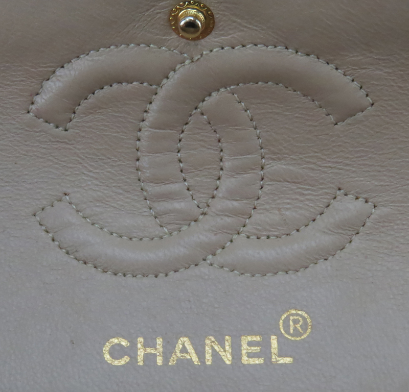 Chanel Beige Quilted Lambskin Double Flap Bag.