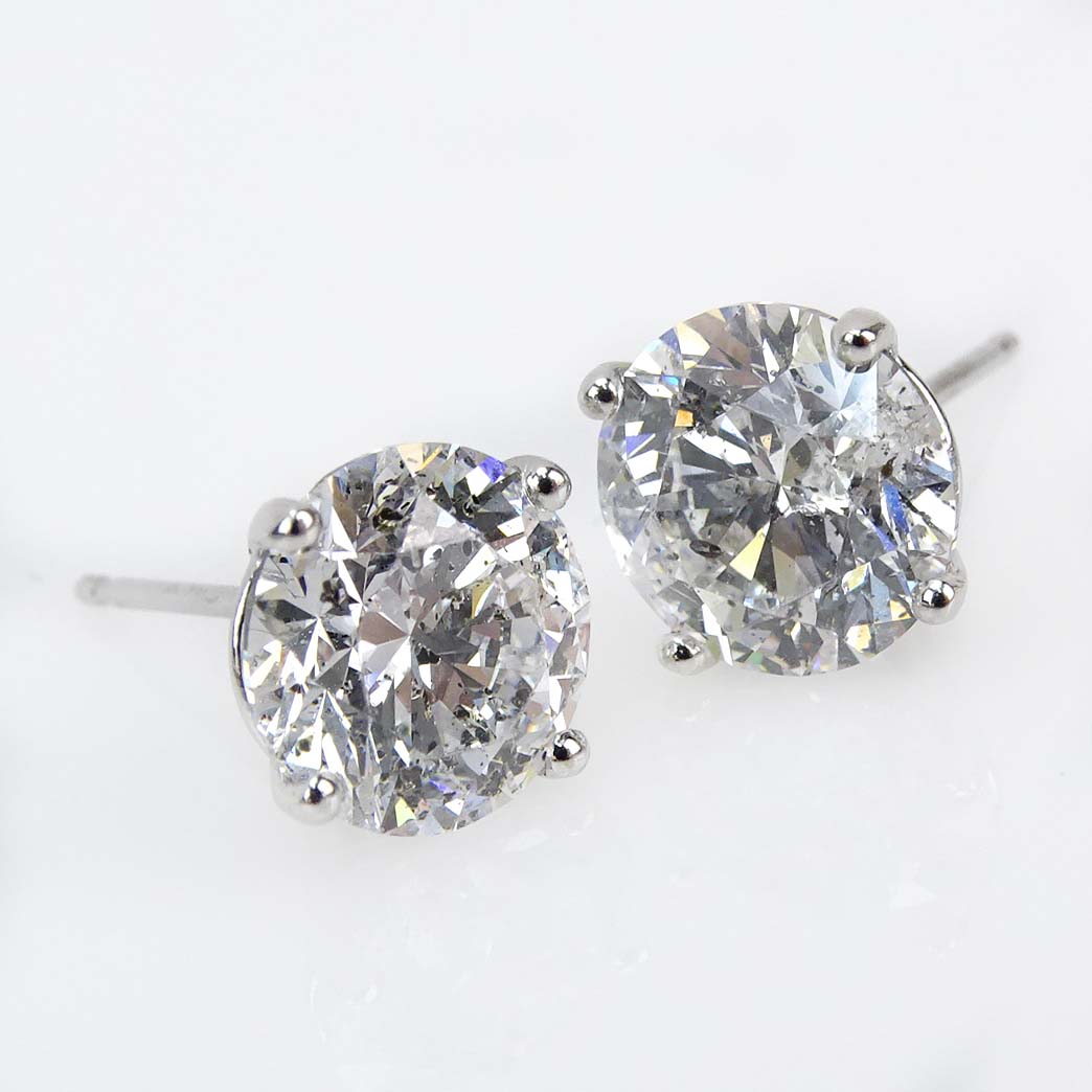 GIA Certified 4.70 Carat TW Round Brilliant Cut Diamond and 18 Karat White Gold Ear Studs.