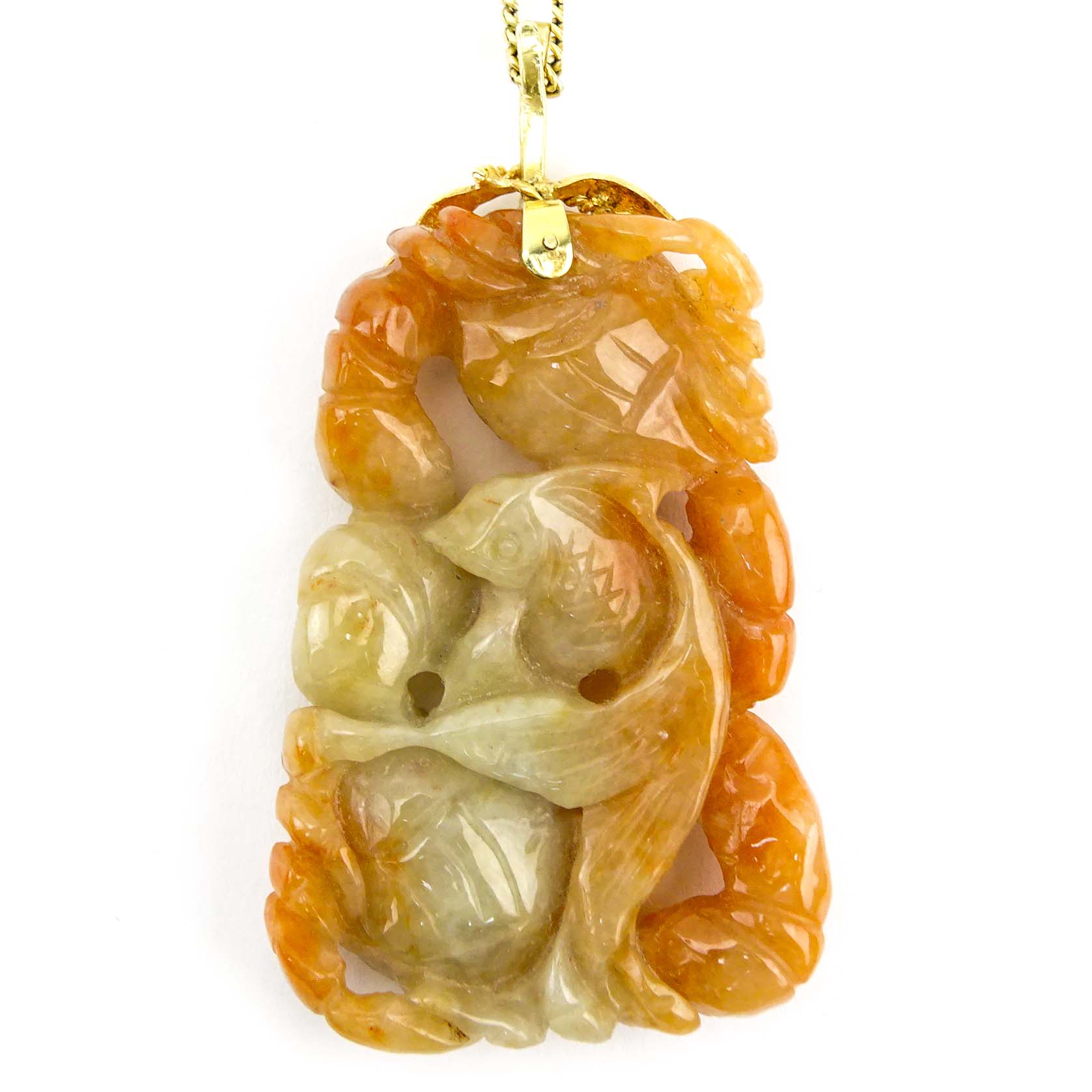 Vintage Chinese Carved Celadon to Russet Jade Pendant Necklace with 14 Karat Yellow Gold Chain.