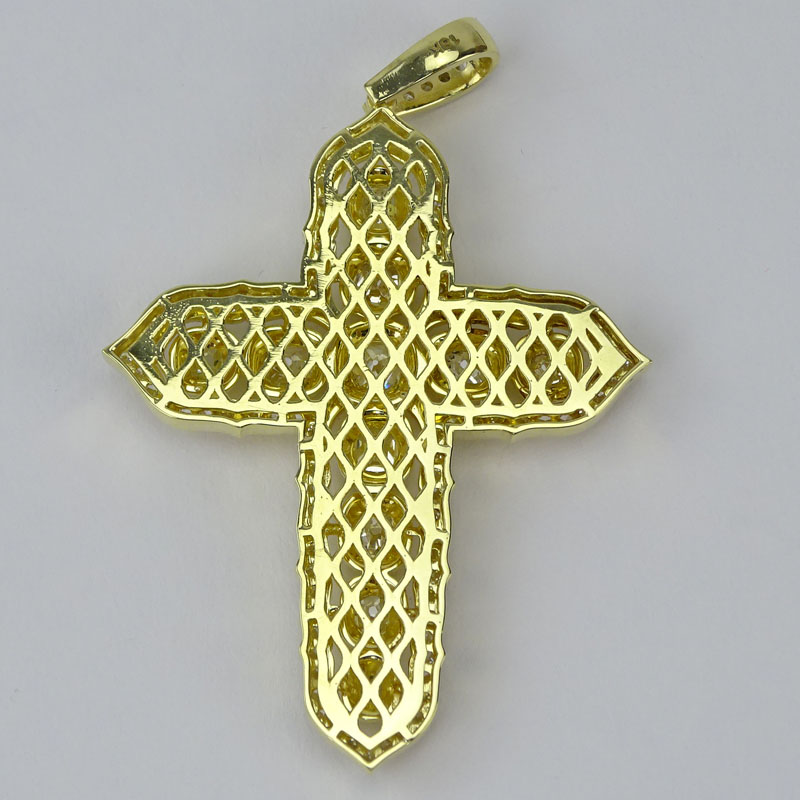 Approx. 11.81 Carat Cushion Cut and Round Brilliant Cut Diamond and 18 Karat Yellow Gold Cross Pendant.