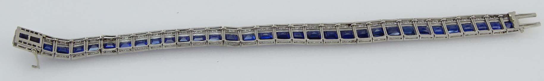 GIA Certified Art Deco 22.0 Carat Unheated Cut Burma Sapphire, 3.50 Carat Diamond and Platinum Bracelet. Superb quality sapphires with vivid saturation of color. 