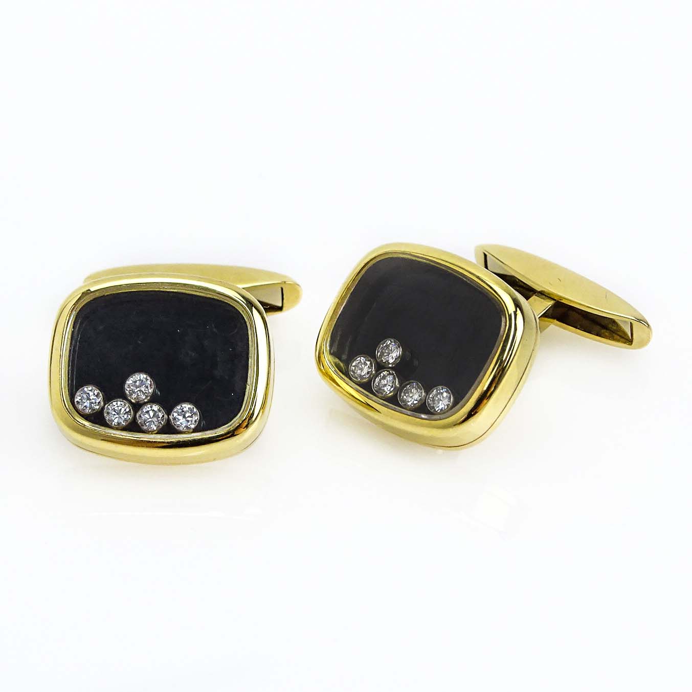 Chopard 18 Karat Yellow Gold, Approx. .50 Carat Diamond and Black Onyx Happy Diamonds Cuff Links.