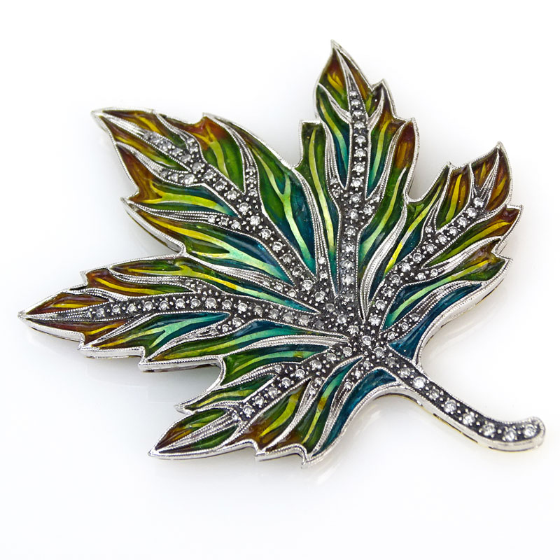 Approx. 1.10 Carat Pave Set Diamond, Enamel and 18 Karat White and Yellow Gold Maple Leaf Brooch. 