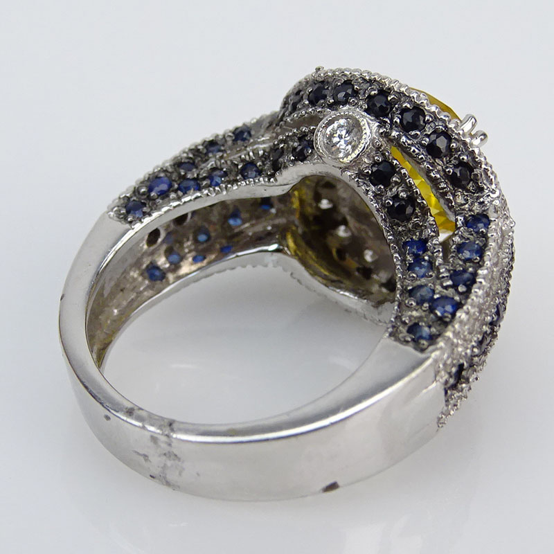 Approx. 9.20 Carat Oval Cushion Cut Citrine, .75 Carat Diamond, Sapphire and 18 Karat White Gold Ring. 