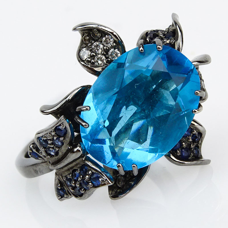 Approx. 8.0 Carat Oval Cushion Cut London Topaz, .20 carat Diamond, .50 Carat Sapphire and 18 Karat White Gold Ring. 