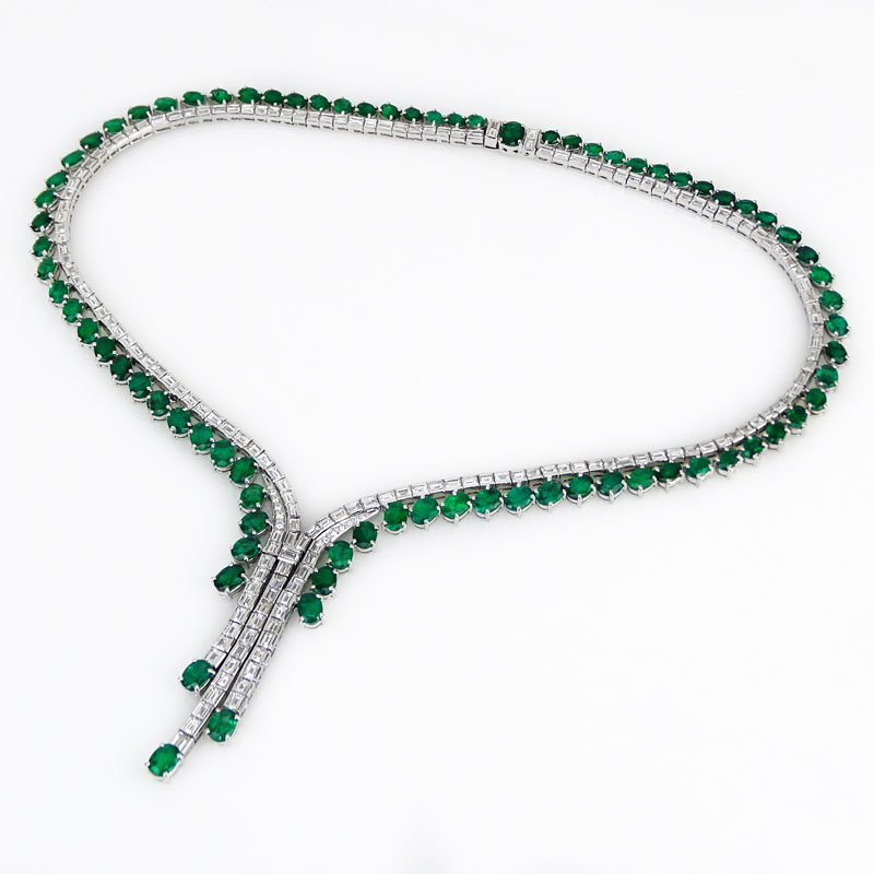 Contemporary Approx. 33.34 Carat Oval Cut Emerald, 14.02 Carat Baguette and Round Brilliant Cut Diamond and 18 Karat White Gold Necklace. 