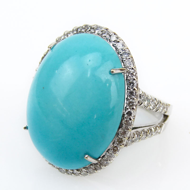 Contemporary Oval Cabochon Turquoise, 1.05 Carat Round Brilliant Cut Diamond and 18 Karat White Gold Ring. 