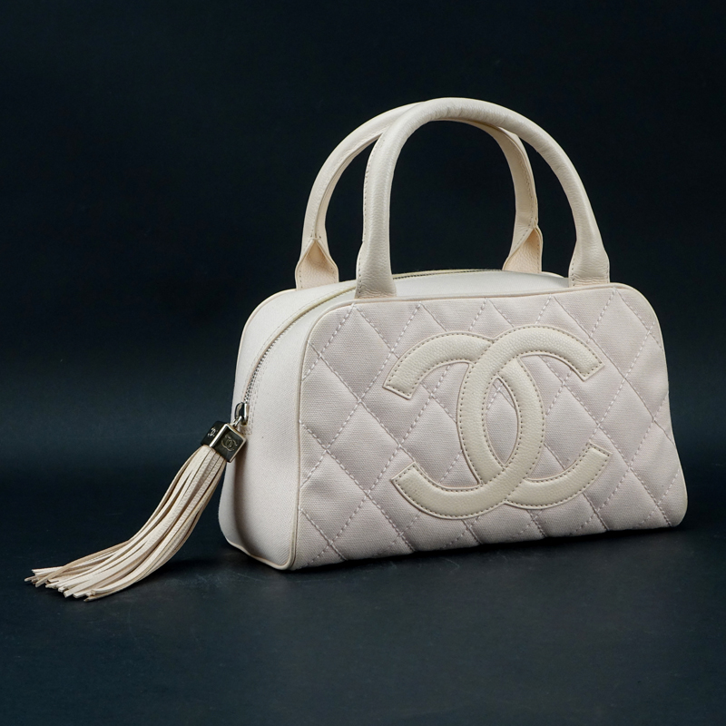 CHANEL BOWLING PINK BAG, two top handles with top zip closure, iconic CC  logo at the front, fabric lining with internal pocket, gold tone hardware,  authenticity card 2003/2004, with dust bag, 27cm