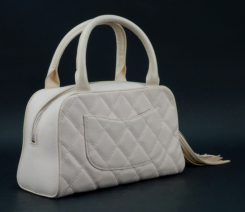 Chanel Baby Pink Quilted Canvas CC Logo Bowler Bag. Silver Tone Hardware, leather tassel zipper pull and handles. 