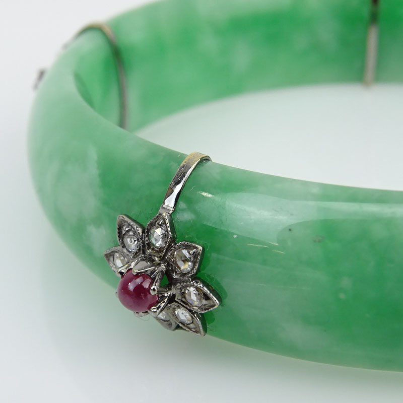 Approx. .80 Carat Diamond, 1.30 Carat Cabochon Ruby and 14 Karat White Gold Mounted Jadeite Bangle Bracelet. 