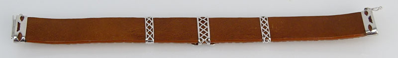 Approx. .45 Carat Diamond and 18 Karat White Gold Mounted Leather Bracelet.