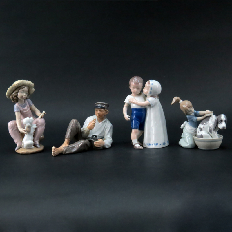 Grouping of Four (4) Porcelain Figurines.