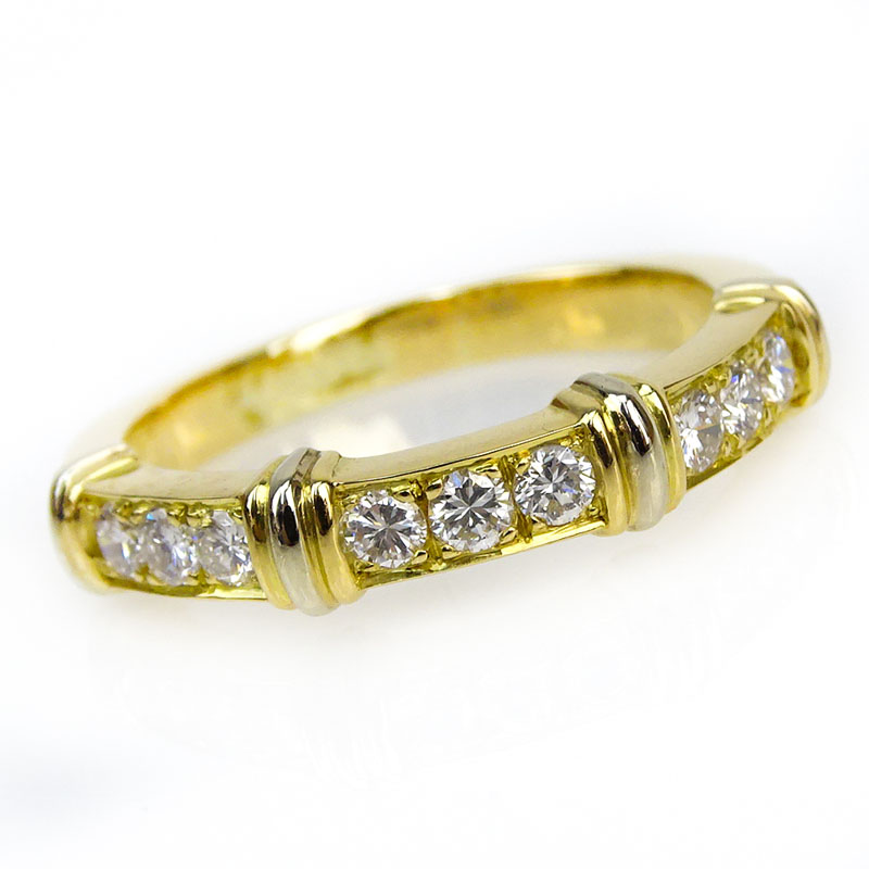 Cartier 18 Karat Yellow Gold and .27 Carat Round Brilliant Cut Diamond Contessa Ring.