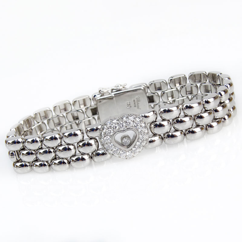 Chopard Approx. .80 Carat Round Brilliant Cut Diamond and 18 Karat White Gold Happy Diamond Heart, Three Row Panther Link Bracelet. 