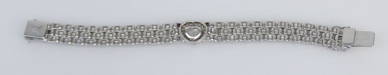 Chopard Approx. .80 Carat Round Brilliant Cut Diamond and 18 Karat White Gold Happy Diamond Heart, Three Row Panther Link Bracelet. 