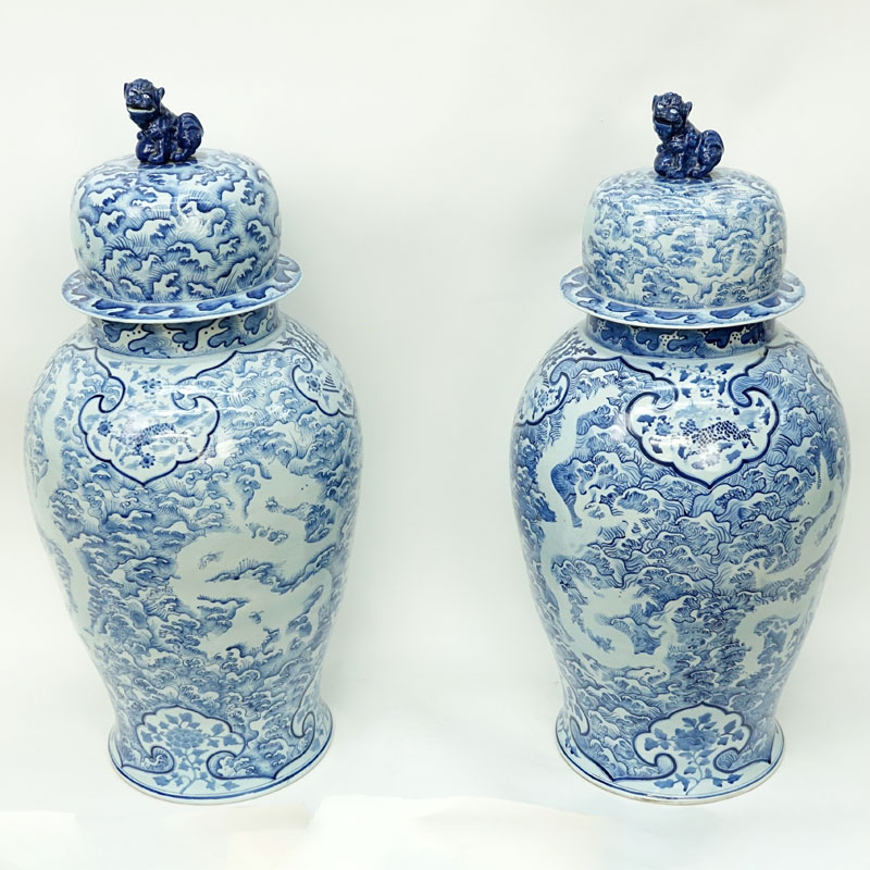 Large Pair of Matching Chinese Blue and White Porcelain Covered Urns.