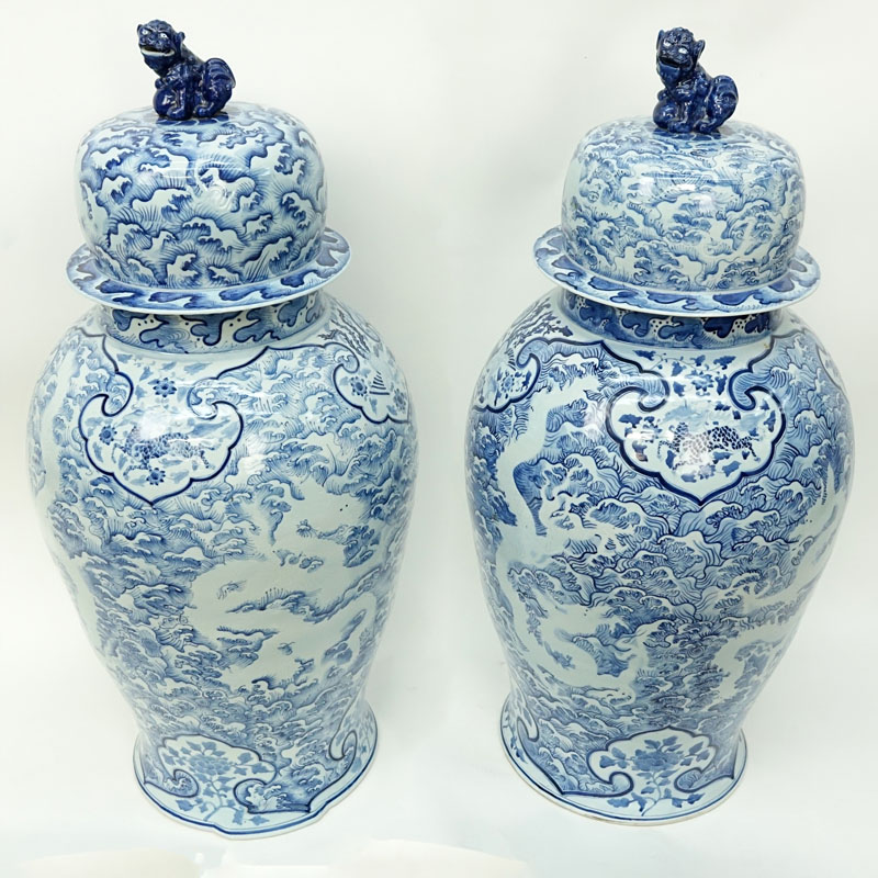 Large Pair of Matching Chinese Blue and White Porcelain Covered Urns.