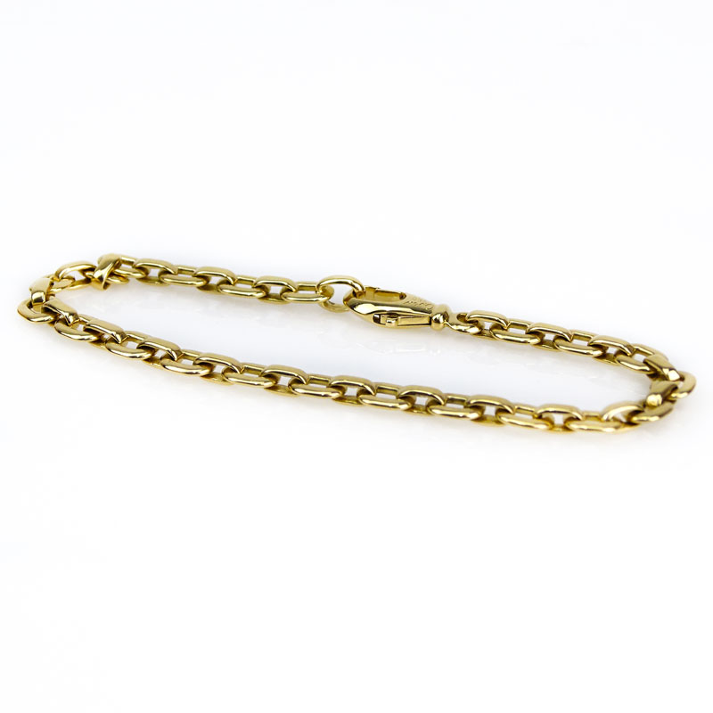 Cartier 18 Karat Yellow Gold Oval Flat Link Bracelet. Signed, numbered 863412.  