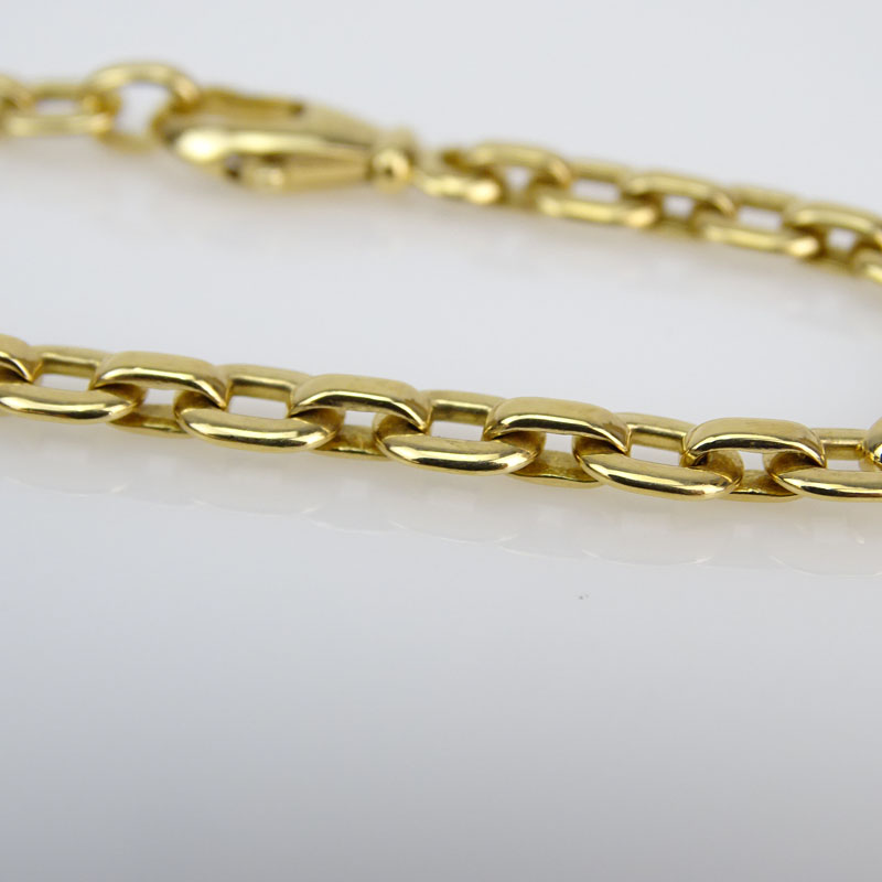 Cartier 18 Karat Yellow Gold Oval Flat Link Bracelet. Signed, numbered 863412.  