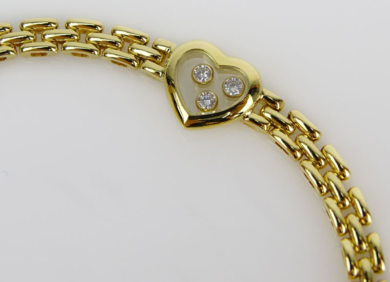 Chopard Approx. .55 Carat Round Brilliant Cut Diamond and 18 Karat White Gold Happy Diamond Heart Four Hearts Panther Link Bracelet.