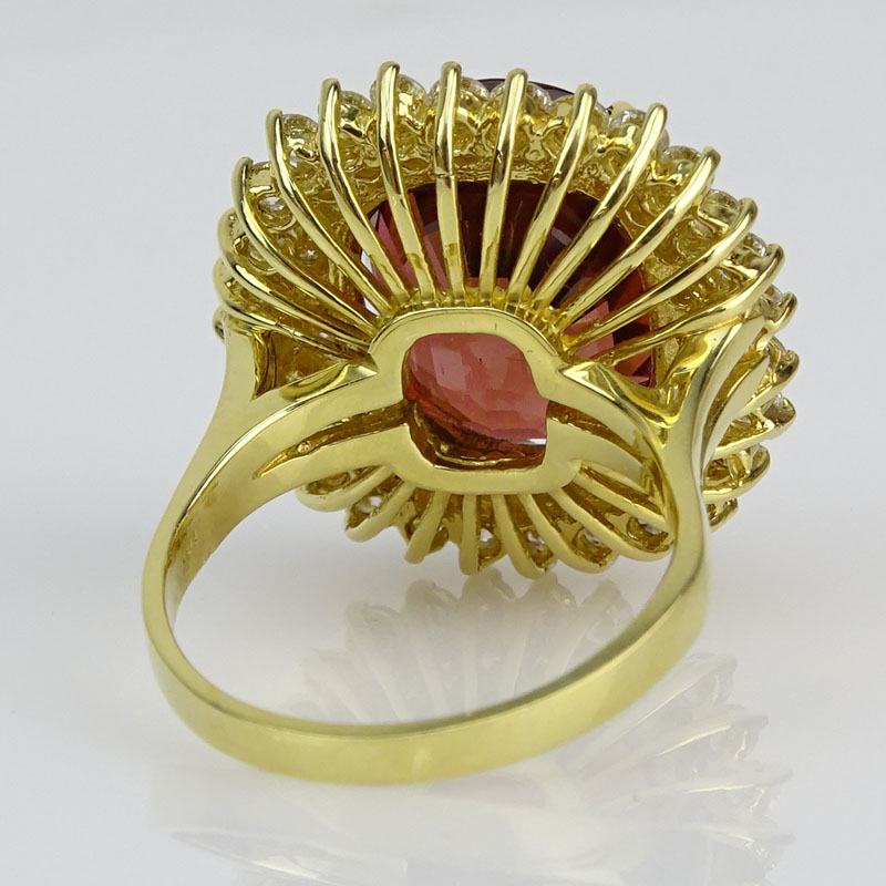 Approx. 20.0 Carat Oval Cut Rubellite, 2.70 Carat Round Brilliant Cut Diamond and 18 Karat yellow Gold Ring. 