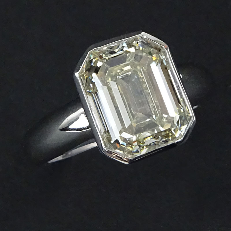 Approx. 5.0 Carat Emerald Cut Diamond and 18 Karat White Gold Engagement Ring.