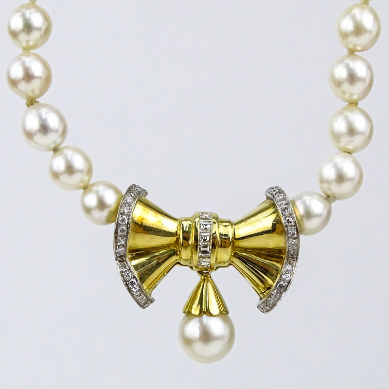 Vintage 6-8mm Pearl, Diamond and 18 Karat Yellow Gold Pendant  Necklace. 