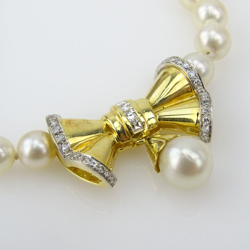 Vintage 6-8mm Pearl, Diamond and 18 Karat Yellow Gold Pendant  Necklace. 