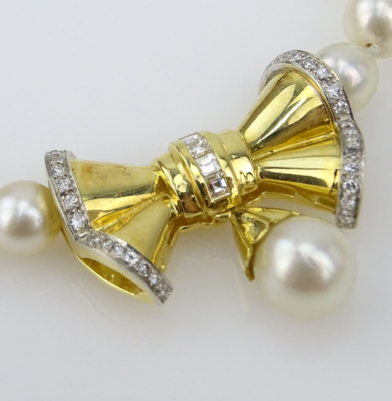 Vintage 6-8mm Pearl, Diamond and 18 Karat Yellow Gold Pendant  Necklace. 