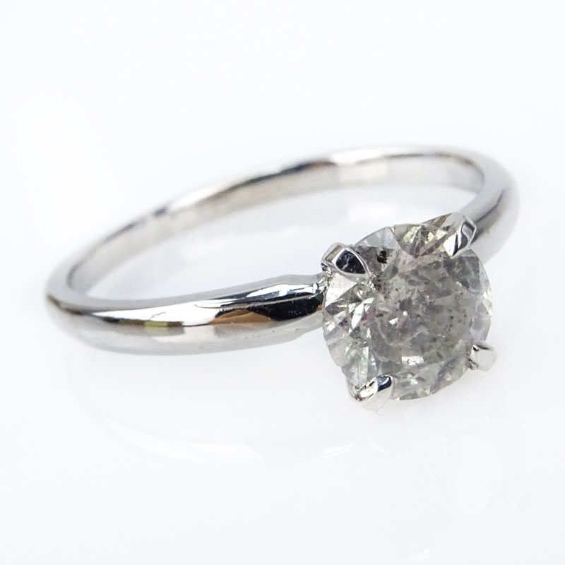 Vintage Approx. .75 Carat Round Brilliant Cut Diamond and 14 Karat White Gold Solitaire Engagement Ring.