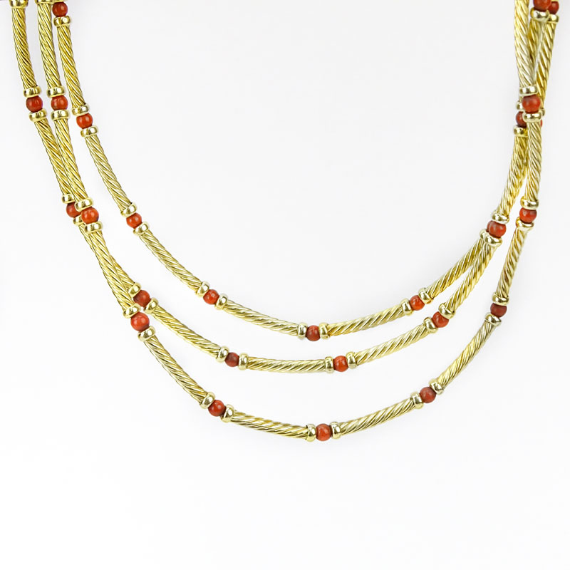 David Yurman 14 Karat Yellow Gold and Red Coral Bead Triple Cable Strand Necklace.