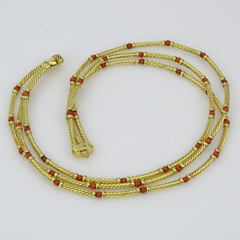 David Yurman 14 Karat Yellow Gold and Red Coral Bead Triple Cable Strand Necklace.