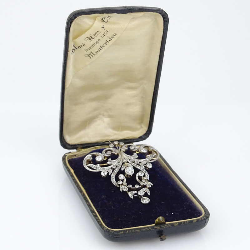 Approx. 2.50 Carat TW Diamond and 14 Karat Yellow Gold Pendant Brooch.