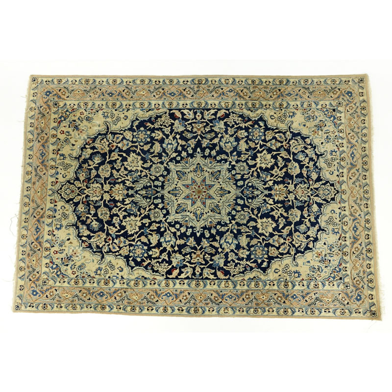 Semi-Antique Wool and Silk Rug.