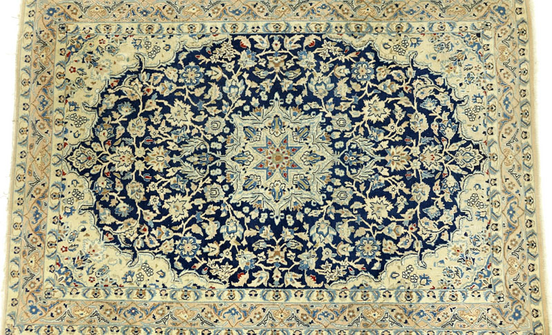 Semi-Antique Wool and Silk Rug.