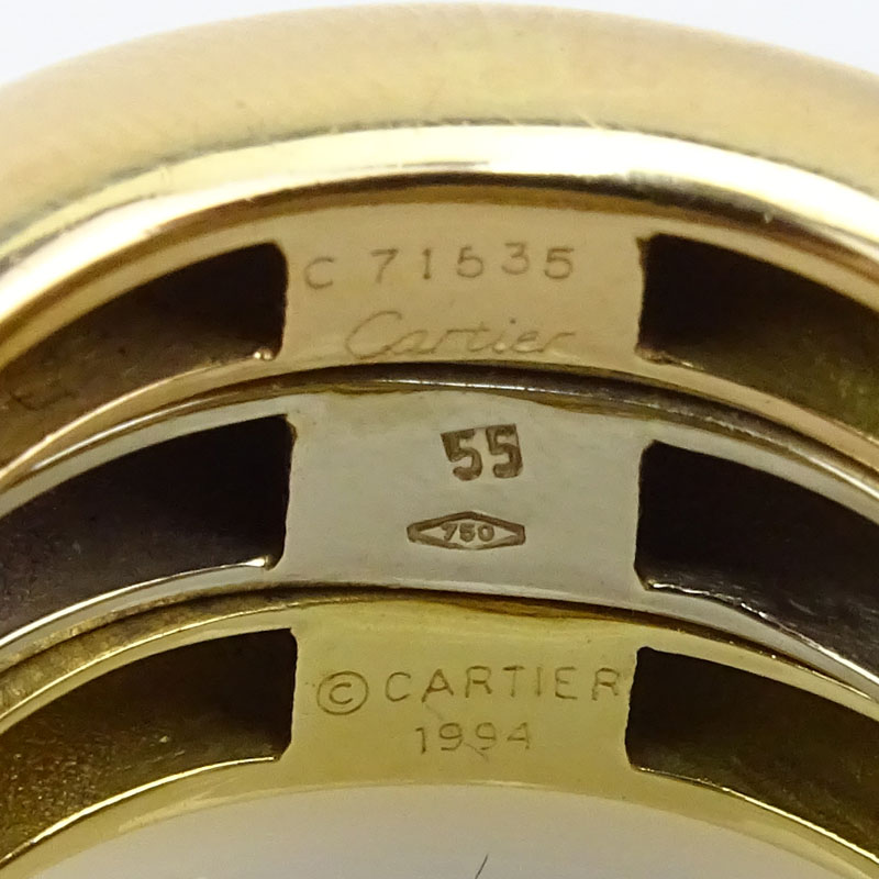 Cartier 18 Karat Tricolor Gold Trinity Ring with Cartier Box and Pouch.