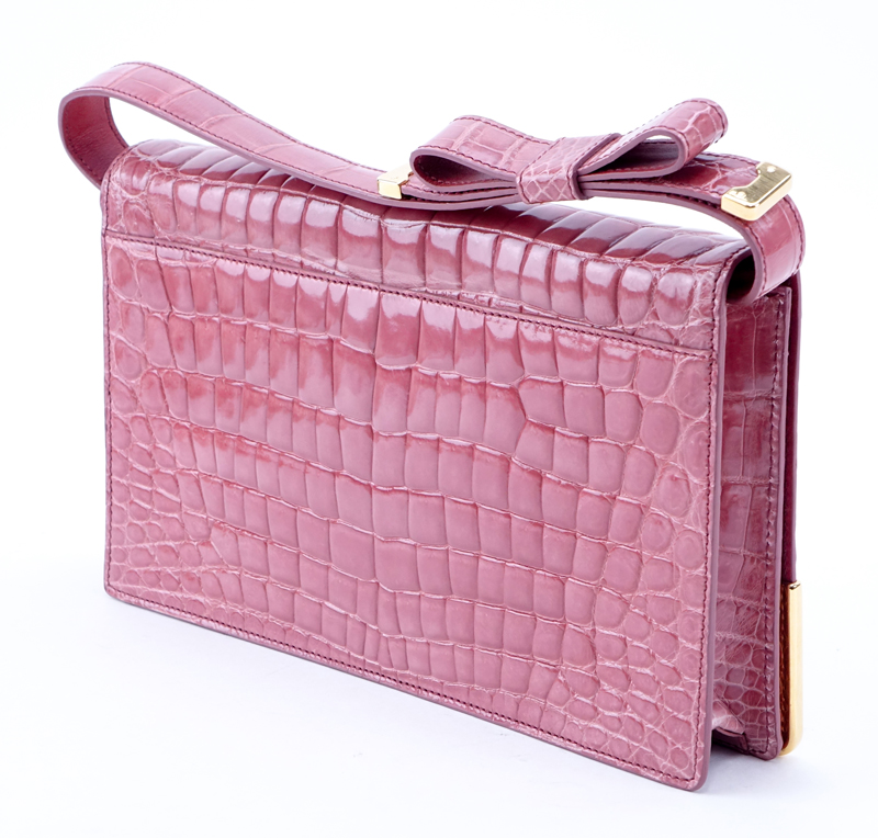 Prada Limited Edition Pink Crocodile Clutch.