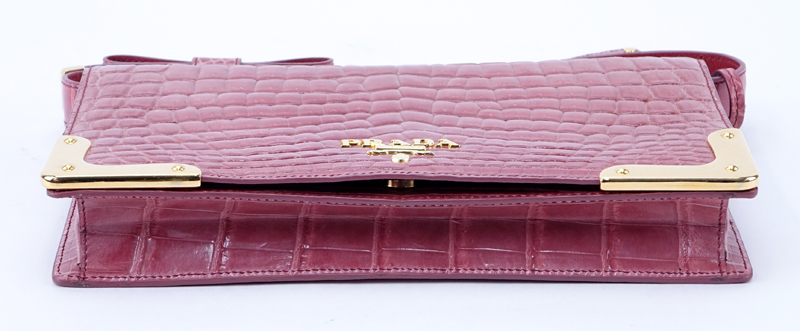 Prada Limited Edition Pink Crocodile Clutch.