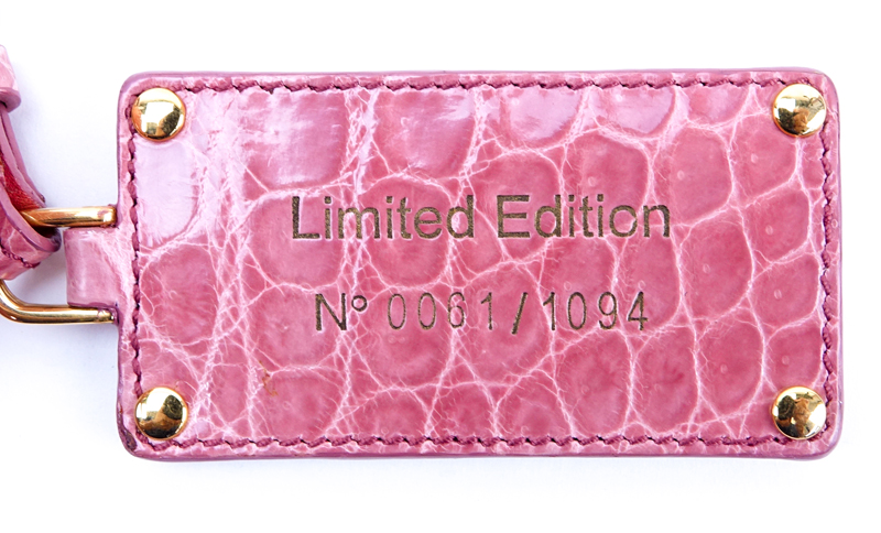 Prada Limited Edition Pink Crocodile Clutch.