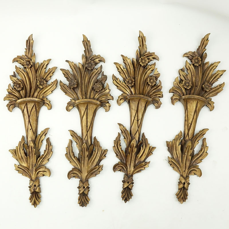 Set of Four (4) Carved Gilt Wood Wall Appliques.