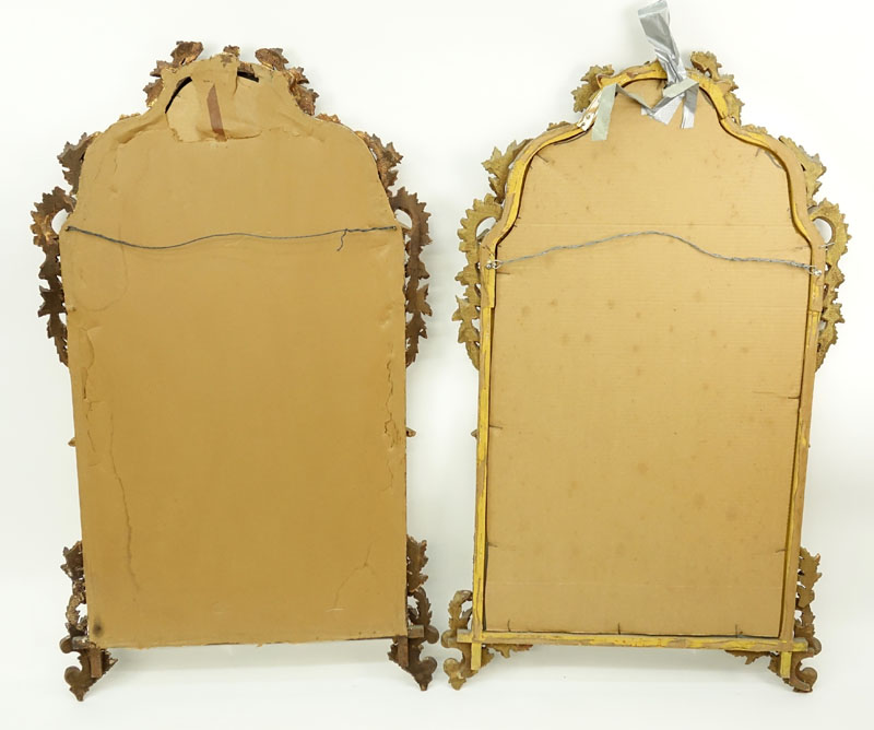 Pair of mid 20th Century Italian Carved and Giltwood Mirrors.